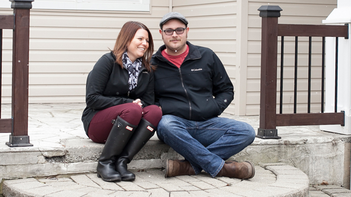 couple sitting outside on steps