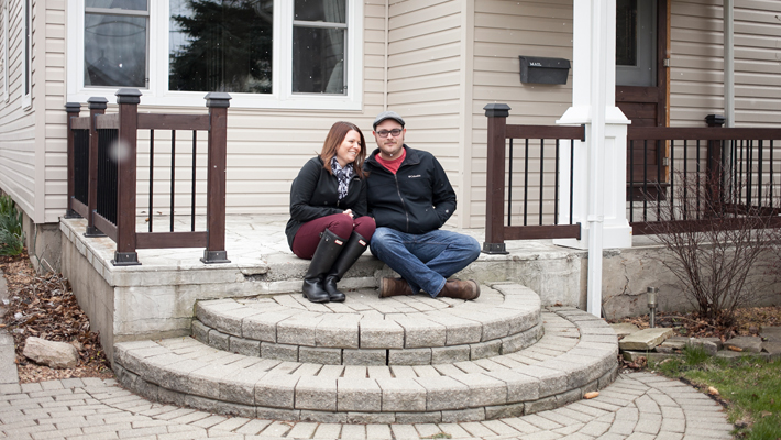 couple sitting outside on steps