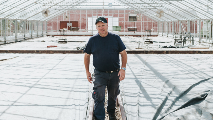farmer in greenhouse